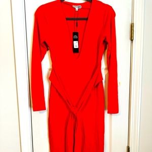 Bright Orange fitted dress with tie.